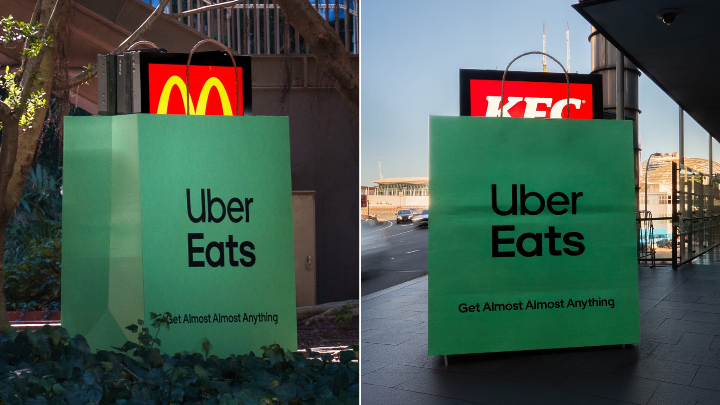 Visuel principal de la campagne Uber Eats Australie Get Almost Almost Anything signée Special dévoilée le 18 juin 2026, panneau publicitaire vertical en bord de route urbain au crépuscule recouvert d'un immense sac vert et noir Uber Eats